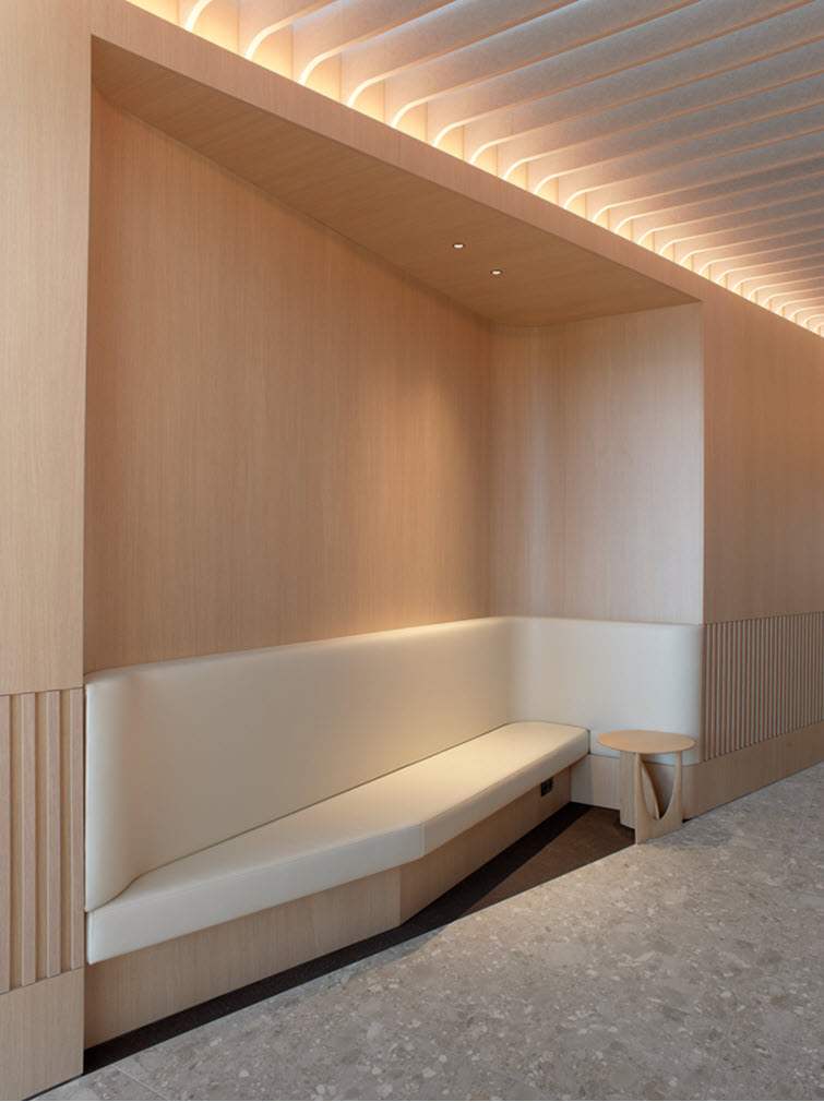 Sunrise Lounge renovation featuring HPL by Unilin Panels transports travelers to warmer destinations